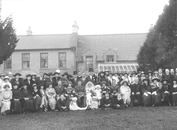 The marriage of Ivan Edward M'Causland to Miss Florence Joan Barrett, wedding group. 