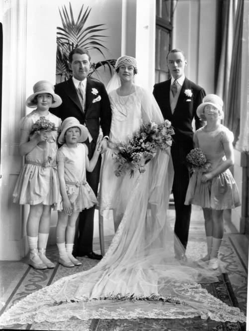 The marriage of Capt. Vivian Steele Parker to Miss Freda Mary Rackham, wedding group with best man and bridesmaids. 