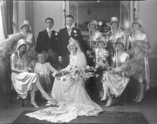 The marriage of William J.R. Connell to Miss Eileen Isobel Raymond Came, wedding group with best man, bridesmaids and train bearers. 