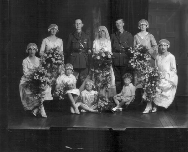 The marriage of Capt. P. Rutherford to Miss Norah Evelyn Evanson-Jones, wedding group with best man and bridesmaids.