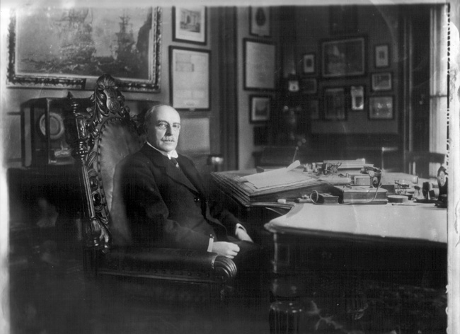 Ernest Adams [unidentified] - detail of telephone on desk shown in upper image 