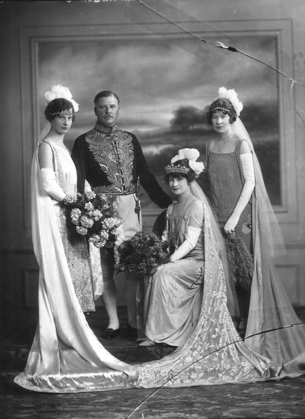 L-R: Miss Daphne (Cecil Rosemary) Harmsworth, later Hon. Mrs. Harold Macneile Dixon (1901- ); Cecil Bisshopp Harmsworth, later 1st Baron Harmsworth, of Egham (1869-1948); Mrs. Cecil Harmsworth, later Emilie Alberta Baroness Harmsworth née Maffett (d.1942); Mrs. Francis Nichols ( ). 