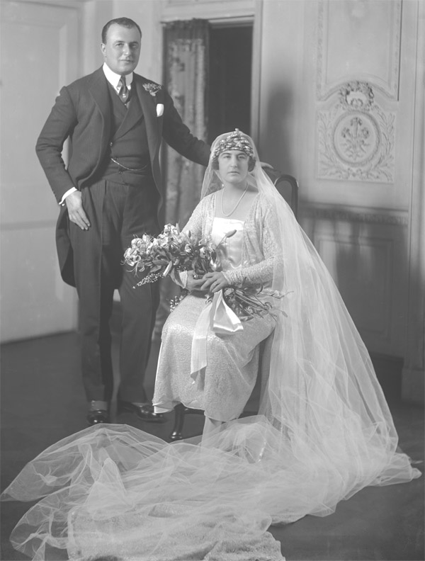(Bride-groom) Captain George Louis St. Clair Bambridge (1892-1943 ), attaché at British Embassy, Madrid (1922-24), at Brussels (1924-5), reappointed to Madrid (1926-8) and at Paris (1929-33); retired 1933; art collector. (Bride) Mrs George Bambridge, née Elsie Kipling (1896-1976), only surviving child of Rudyard Kipling; m. (1924) Captain George Louis St. Clair Bambridge.